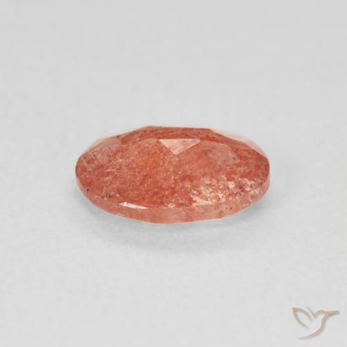 Piedrasol Naranja rojizo natural de 0.91 ct, Ovalada, Translúcido