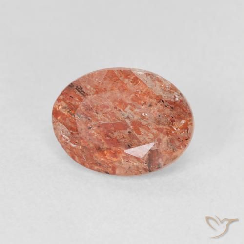 Piedrasol Naranja rojizo natural de 1.23 ct, Ovalada, Translúcido