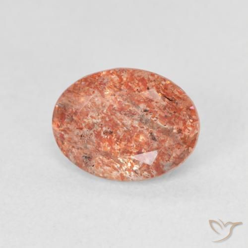 Piedrasol Naranja rojizo natural de 1.31 ct, Ovalada, Translúcido