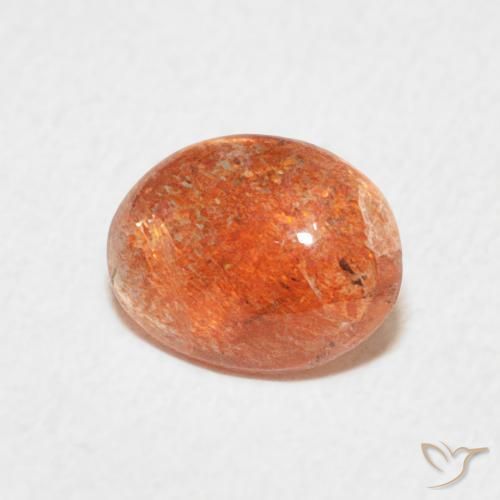 Piedrasol Naranja claro natural de 0.91 ct, Ovalada, Translúcido