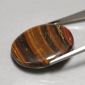 Tiger's eye matrix multicolor natural de 53,09 ct, corte óvalo, opaco