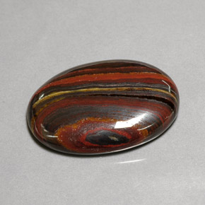 Tiger's eye matrix multicolor natural de 45,58 ct, corte óvalo, opaco