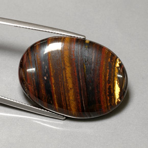 Tiger's eye matrix multicolor natural de 43,53 ct, corte óvalo, opaco