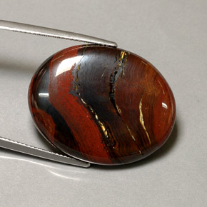 Tiger's eye matrix multicolor natural de 41,60 ct, corte óvalo, opaco