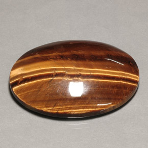 Tiger's eye marrón natural de 74,22 ct, corte óvalo, opaco