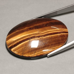 Tiger's eye marrón natural de 74,22 ct, corte óvalo, opaco