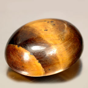 Ojo de Tigre Marrón oro natural de 24.55 ct, Corte Óvalo, Opaco