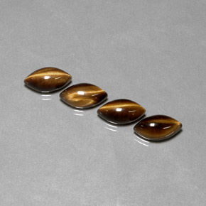 Gemas de tiger's eye marrón natural de  ct, marquesa, opaco