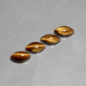 Gemas de tiger's eye marrón natural de  ct, marquesa, opaco