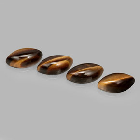 Gemas de tiger's eye marrón natural de  ct, marquesa, opaco