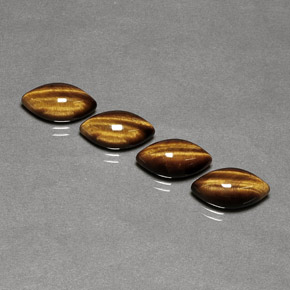 Gemas de tiger's eye marrón natural de  ct, marquesa, opaco