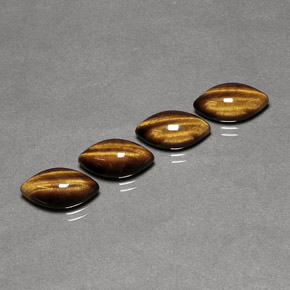 Gemas de tiger's eye marrón natural de  ct, marquesa, opaco