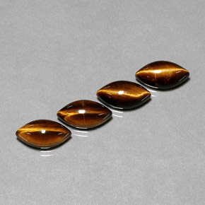 Gemas de tiger's eye marrón natural de  ct, marquesa, opaco