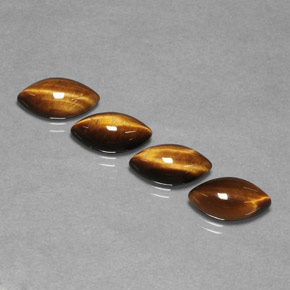 Gemas de tiger's eye marrón natural de  ct, marquesa, opaco