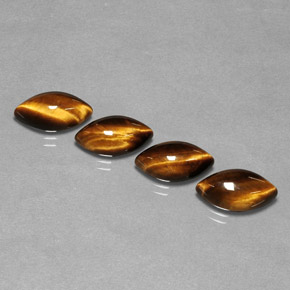Gemas de tiger's eye marrón natural de  ct, marquesa, opaco
