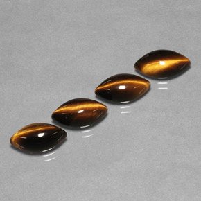Gemas de tiger's eye marrón natural de  ct, marquesa, opaco