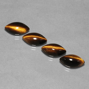 Gemas de tiger's eye marrón natural de  ct, marquesa, opaco