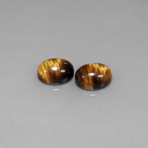 Gemas de tiger's eye marrón natural de  ct, corte óvalo, opaco