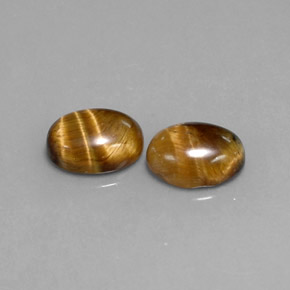 Gemas de tiger's eye marrón natural de  ct, corte óvalo, opaco