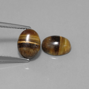 Gemas de tiger's eye marrón natural de  ct, corte óvalo, opaco