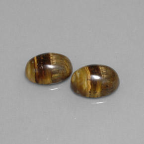 Gemas de tiger's eye marrón natural de  ct, corte óvalo, opaco