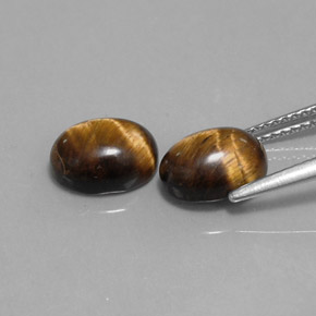 Gemas de tiger's eye marrón natural de  ct, corte óvalo, opaco