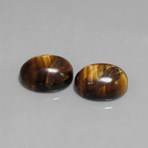 Gemas de tiger's eye marrón natural de  ct, corte óvalo, opaco