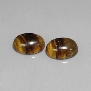 Gemas de tiger's eye marrón natural de  ct, corte óvalo, opaco
