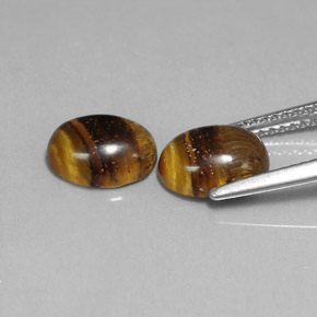 Gemas de tiger's eye marrón natural de  ct, corte óvalo, opaco