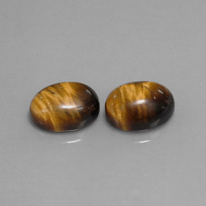 Gemas de tiger's eye marrón natural de  ct, corte óvalo, opaco