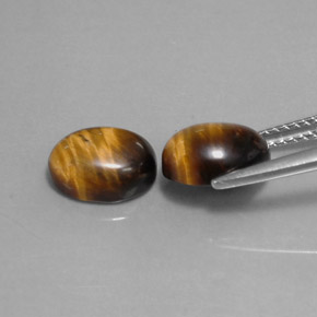 Gemas de tiger's eye marrón natural de  ct, corte óvalo, opaco