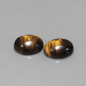 Gemas de tiger's eye marrón natural de  ct, corte óvalo, opaco