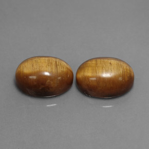 Gemas de tiger's eye marrón natural de  ct, corte óvalo, opaco