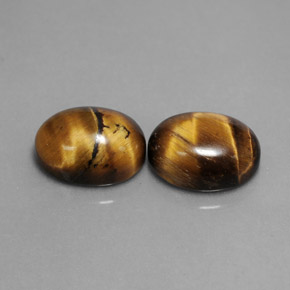 Gemas de tiger's eye marrón natural de  ct, corte óvalo, opaco
