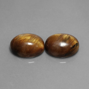 Gemas de tiger's eye marrón natural de  ct, corte óvalo, opaco