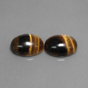 Gemas de tiger's eye marrón natural de  ct, corte óvalo, opaco