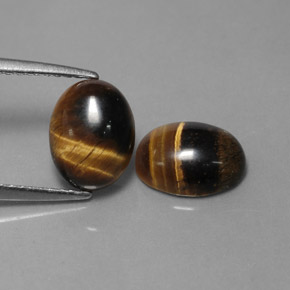 Gemas de tiger's eye marrón natural de  ct, corte óvalo, opaco