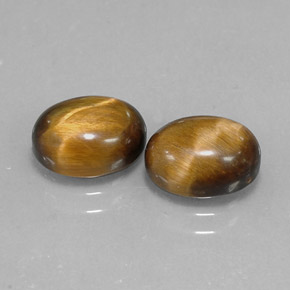 Gemas de tiger's eye marrón natural de  ct, corte óvalo, opaco