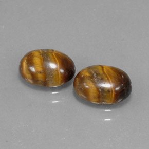 Gemas de tiger's eye marrón natural de  ct, corte óvalo, opaco