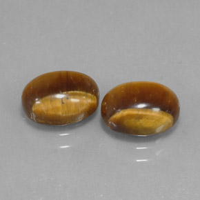 Gemas de tiger's eye marrón natural de  ct, corte óvalo, opaco