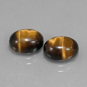 Gemas de tiger's eye marrón natural de  ct, corte óvalo, opaco