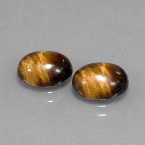 Gemas de ojo de tigre marrón dorado natural de  ct, corte óvalo, opaco