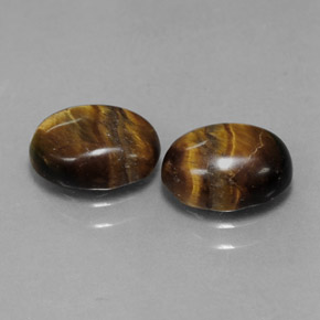 Gemas de tiger's eye marrón natural de  ct, corte óvalo, opaco