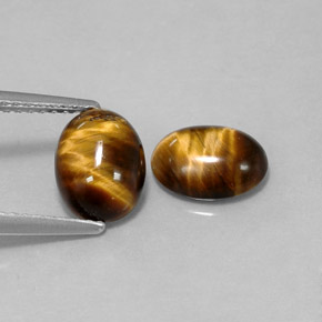 Gemas de tiger's eye marrón natural de  ct, corte óvalo, opaco
