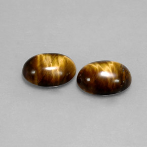 Gemas de tiger's eye marrón natural de  ct, corte óvalo, opaco
