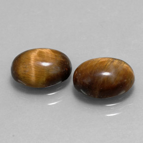 Gemas de tiger's eye marrón natural de  ct, corte óvalo, opaco