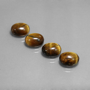 Gemas de tiger's eye marrón natural de  ct, corte óvalo, opaco
