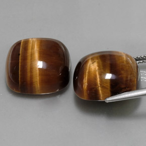 Gemas de tiger's eye marrón natural de  ct, corte cojín, opaco