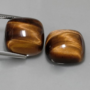 Gemas de tiger's eye marrón natural de  ct, corte cojín, opaco