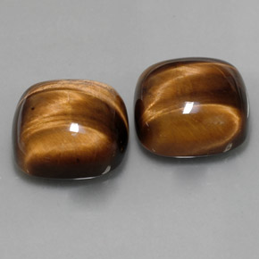 Gemas de tiger's eye marrón natural de  ct, corte cojín, opaco